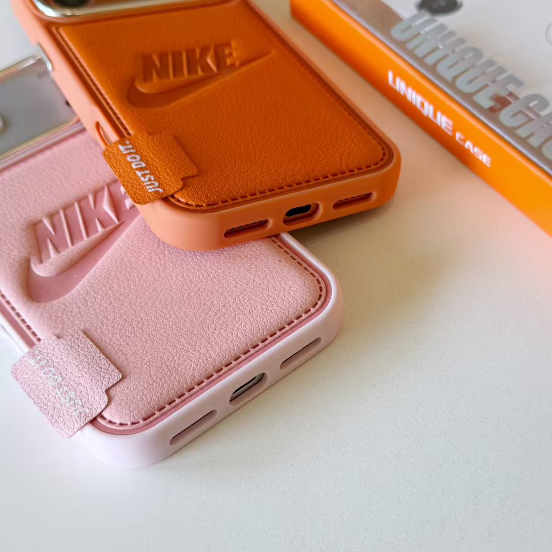 Nike Leather Engraved Logo iPhone Case with Chrome Camera Guard – iPhone 13 to 17 Pro Max
