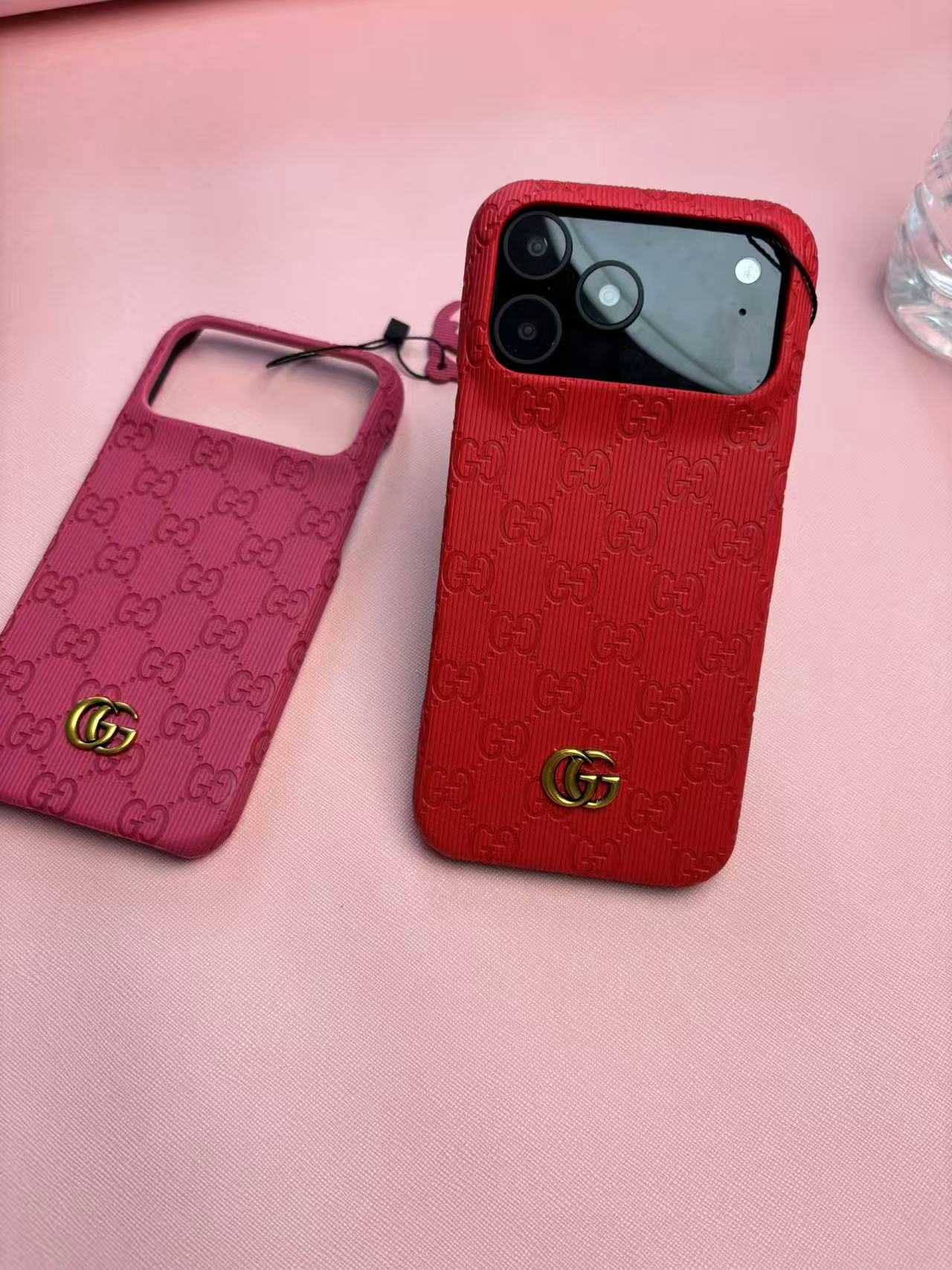 Gucci Embossed GG Ribbed iPhone Case with Logo Charm – iPhone 13 to 17 Pro Max