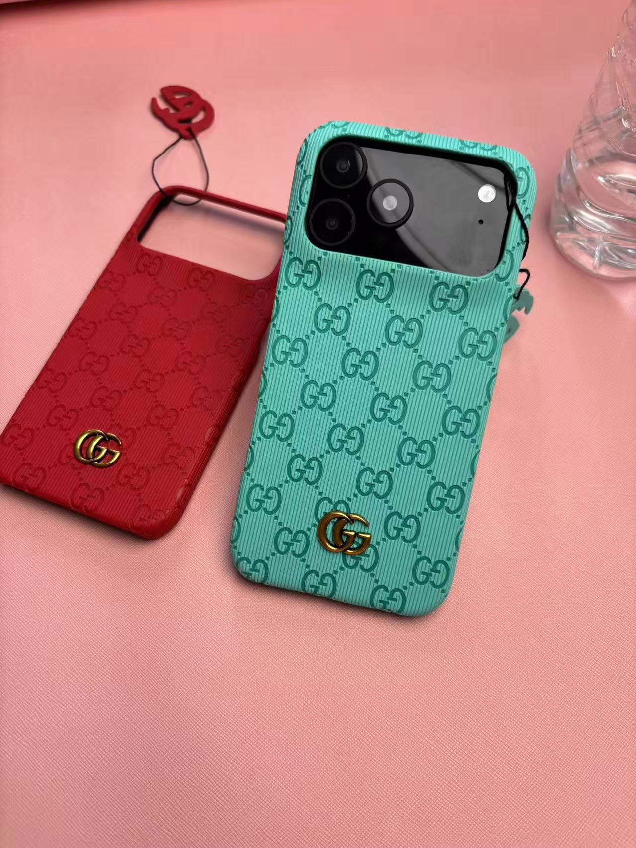 Gucci Embossed GG Ribbed iPhone Case with Logo Charm – iPhone 13 to 17 Pro Max