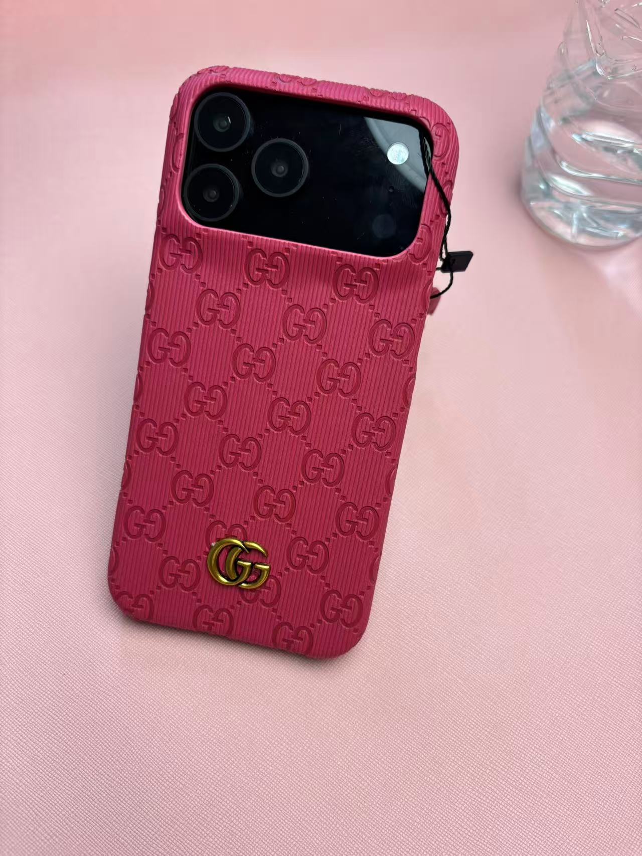 Gucci Embossed GG Ribbed iPhone Case with Logo Charm – iPhone 13 to 17 Pro Max