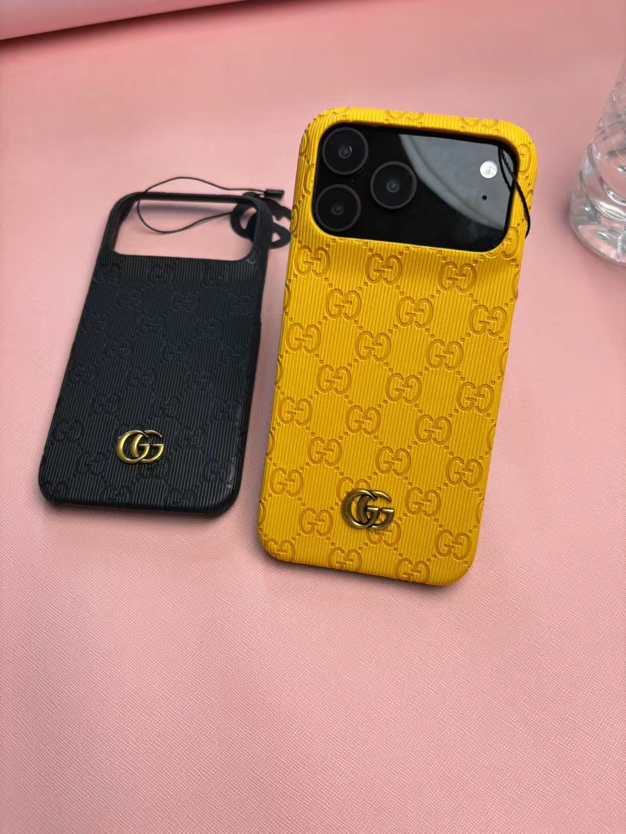 Gucci Embossed GG Ribbed iPhone Case with Logo Charm – iPhone 13 to 17 Pro Max