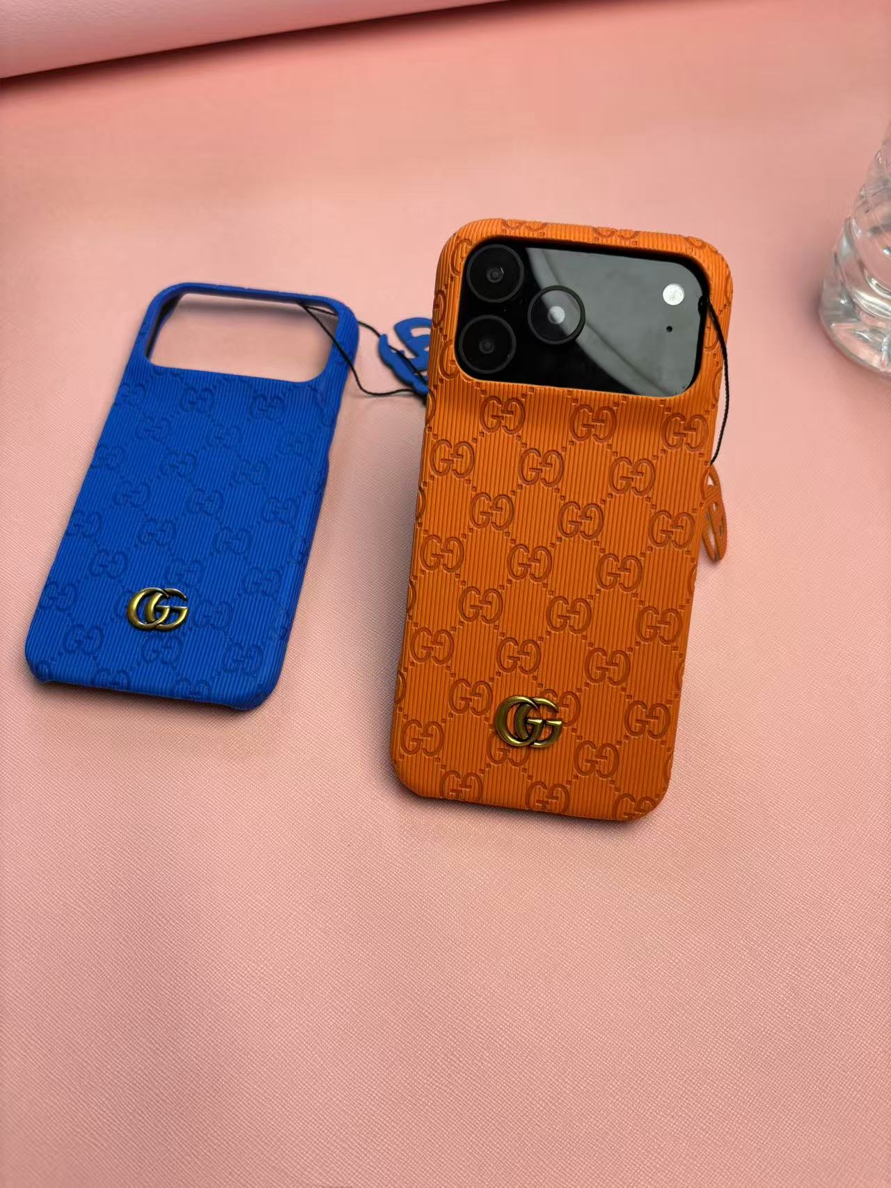 Gucci Embossed GG Ribbed iPhone Case with Logo Charm – iPhone 13 to 17 Pro Max