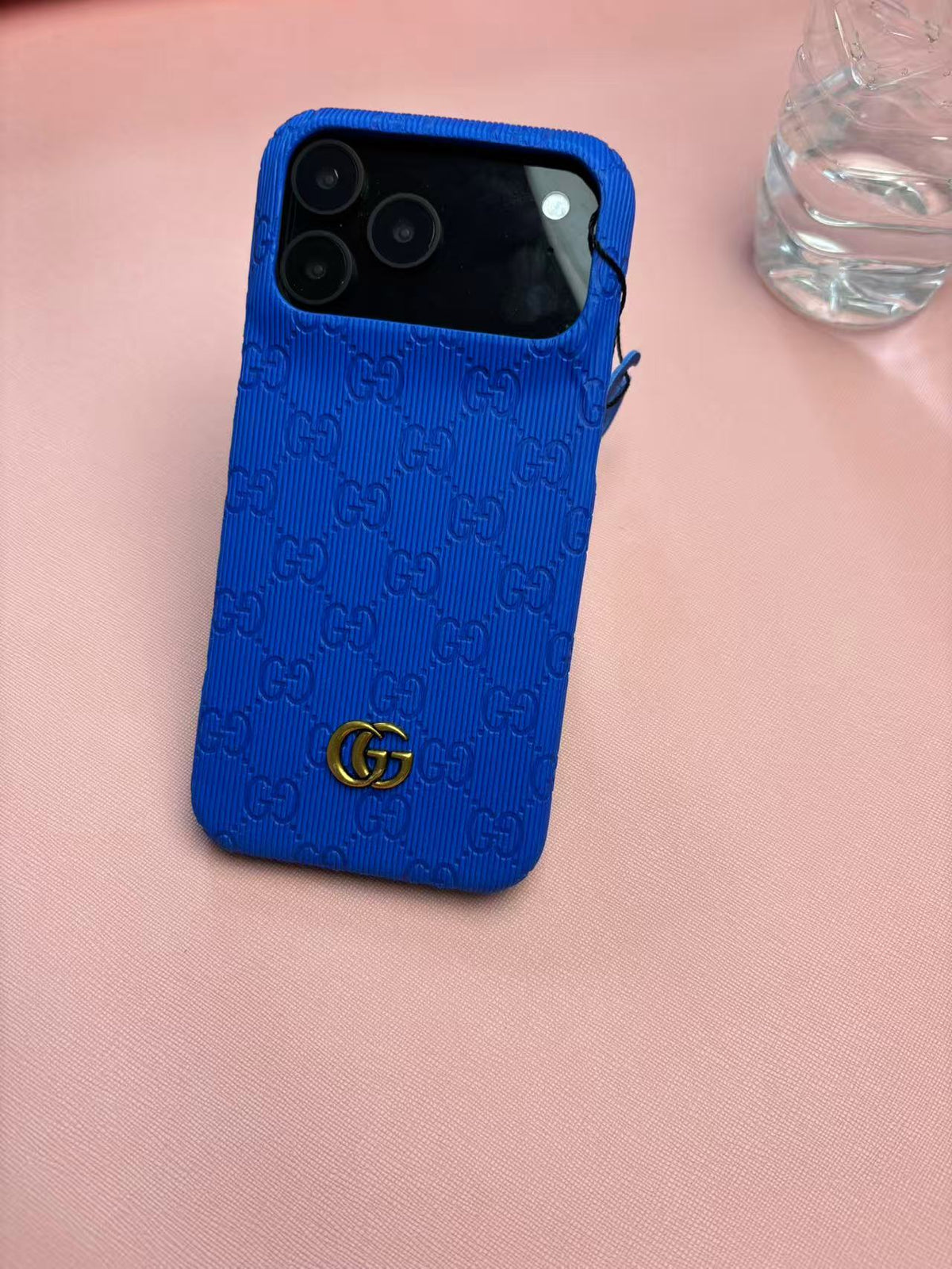 Gucci Embossed GG Ribbed iPhone Case with Logo Charm – iPhone 13 to 18 Pro Max
