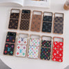 HypedEffect Gucci and Louis Vuitton Z Flip/Z Fold Phone Cases - Iconic Patterns and Golden Frame Luxury